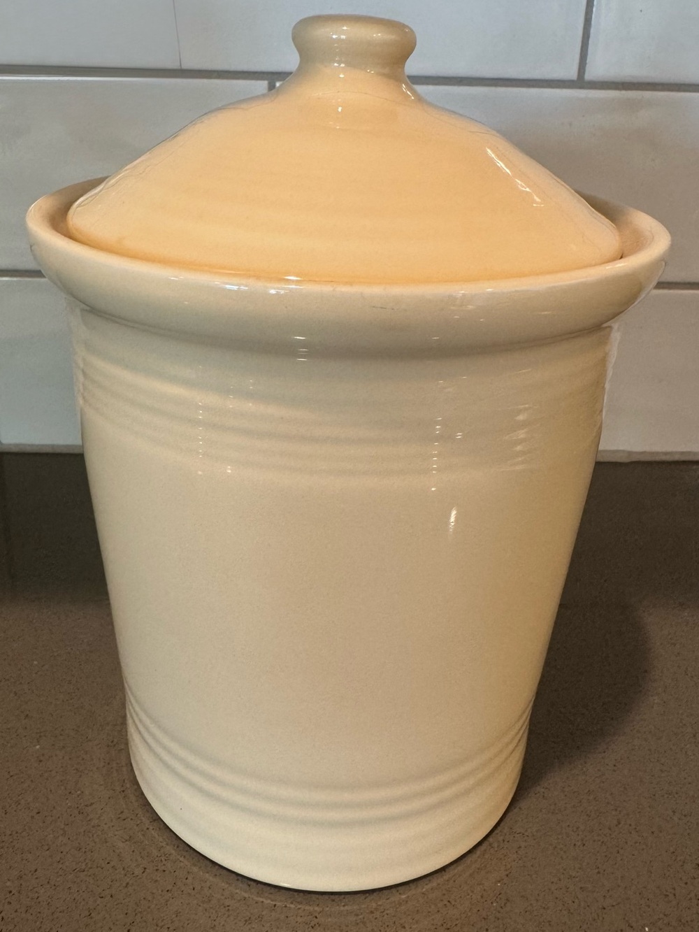 Vintage fiestaware canister in ivory. Medium size